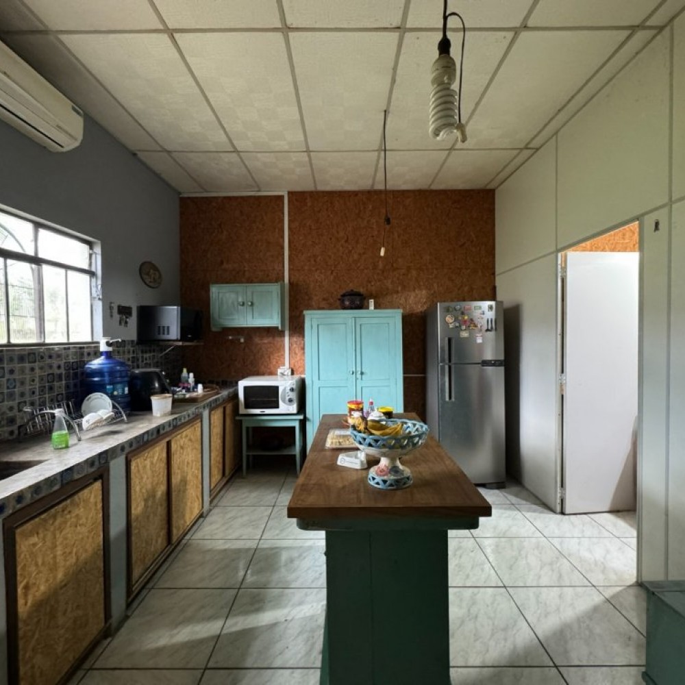 Terreno com casa / construo 